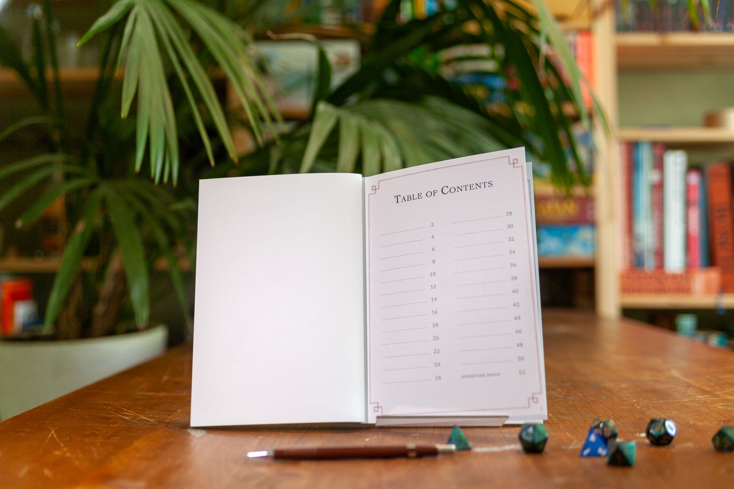 The first page of the Adventure Log is a blank table of contents. The player can write down the names of sessions, the date, or the name of the character that was played that session. It's up to them! At the bottom you can see that on the last page of this DnD notebook is an adventure bingo.